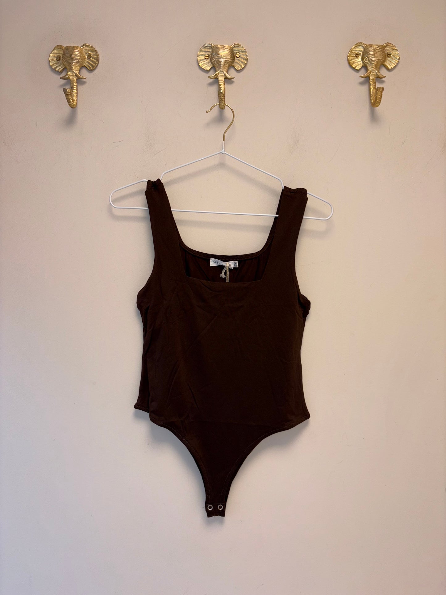 Fitted brown bodysuit